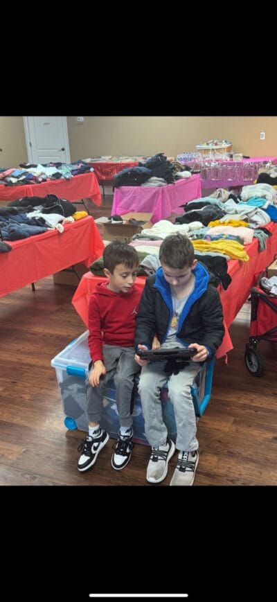 boys playing with iPad