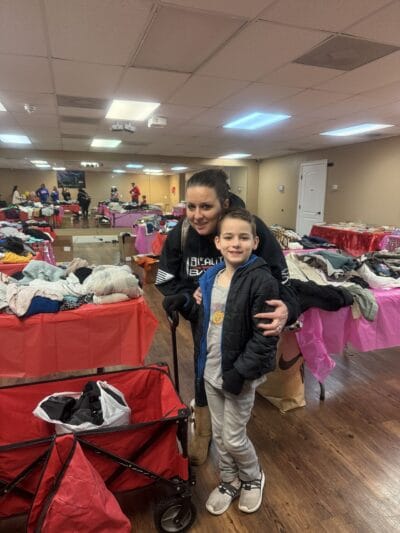 mom hugging a little boy