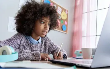 Student working with her lapotp