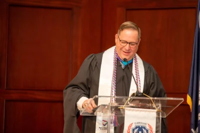 Teacher speaking at graduation