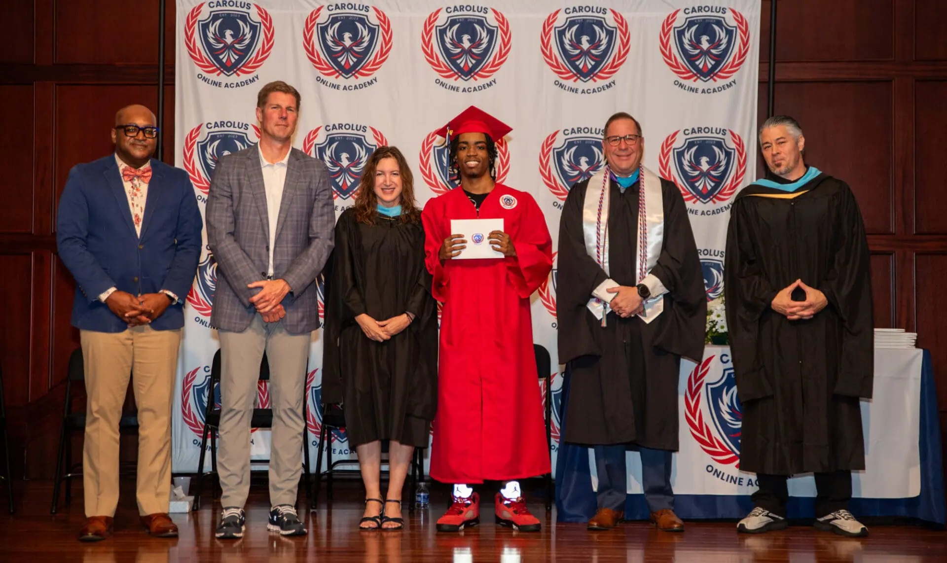 Graduated student with his diploma