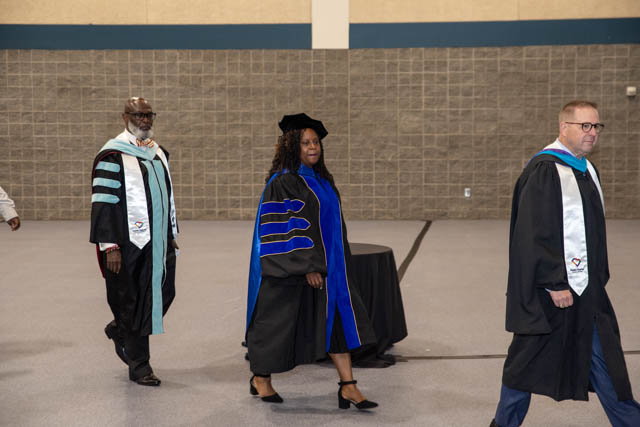 teachers preparing the graduation