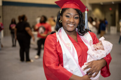 graduated girl with little baby